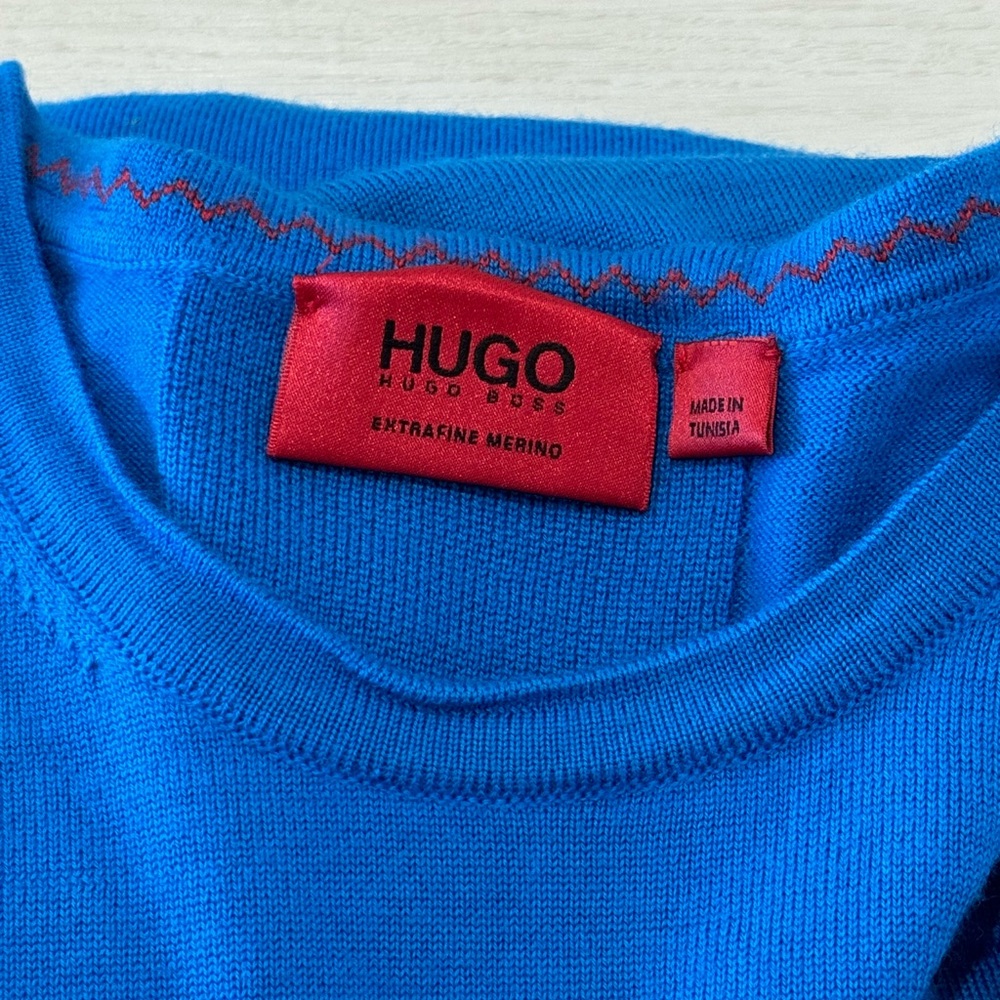 Like-new blue Hugo Boss long-sleeve sweater made from premium Merino wool